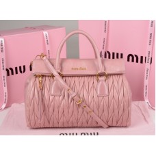 Kožená kabelka Miu Miu Glazed Matelasse se zipem v růžové barvě